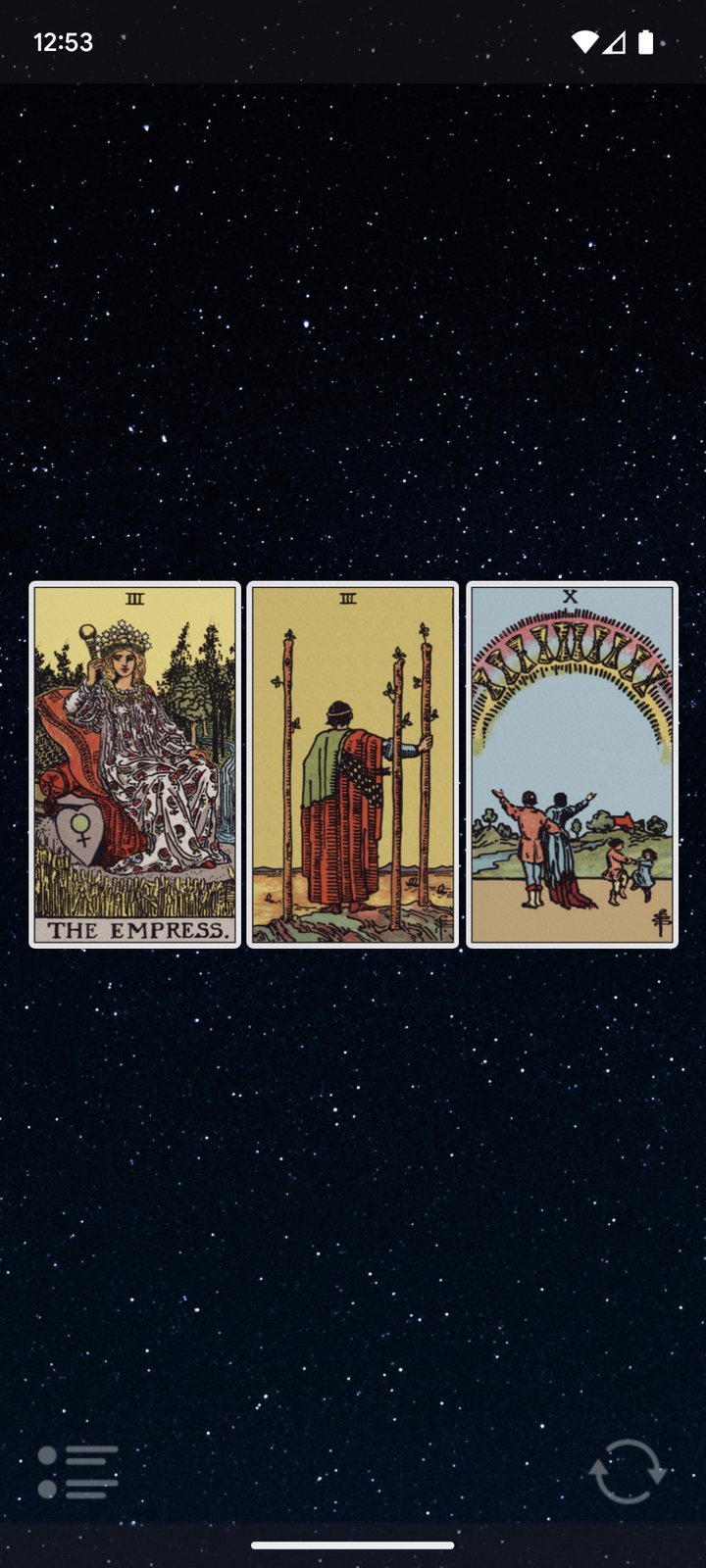 Three cards revealed in a spread